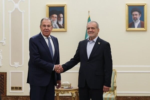 Iranian President Masoud Pezeshkian meeting Russian Foreign Minister Sergei Lavrov in Tehran