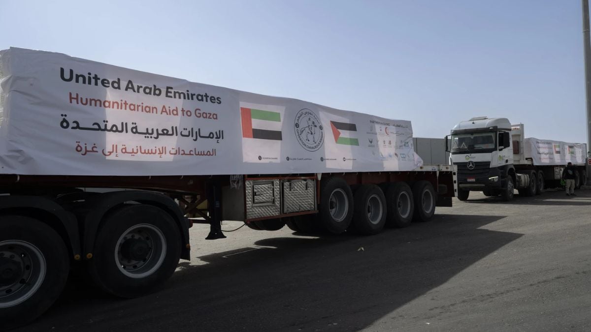 Trucks carrying UAE humanitarian aid supplies enter the Gaza Strip